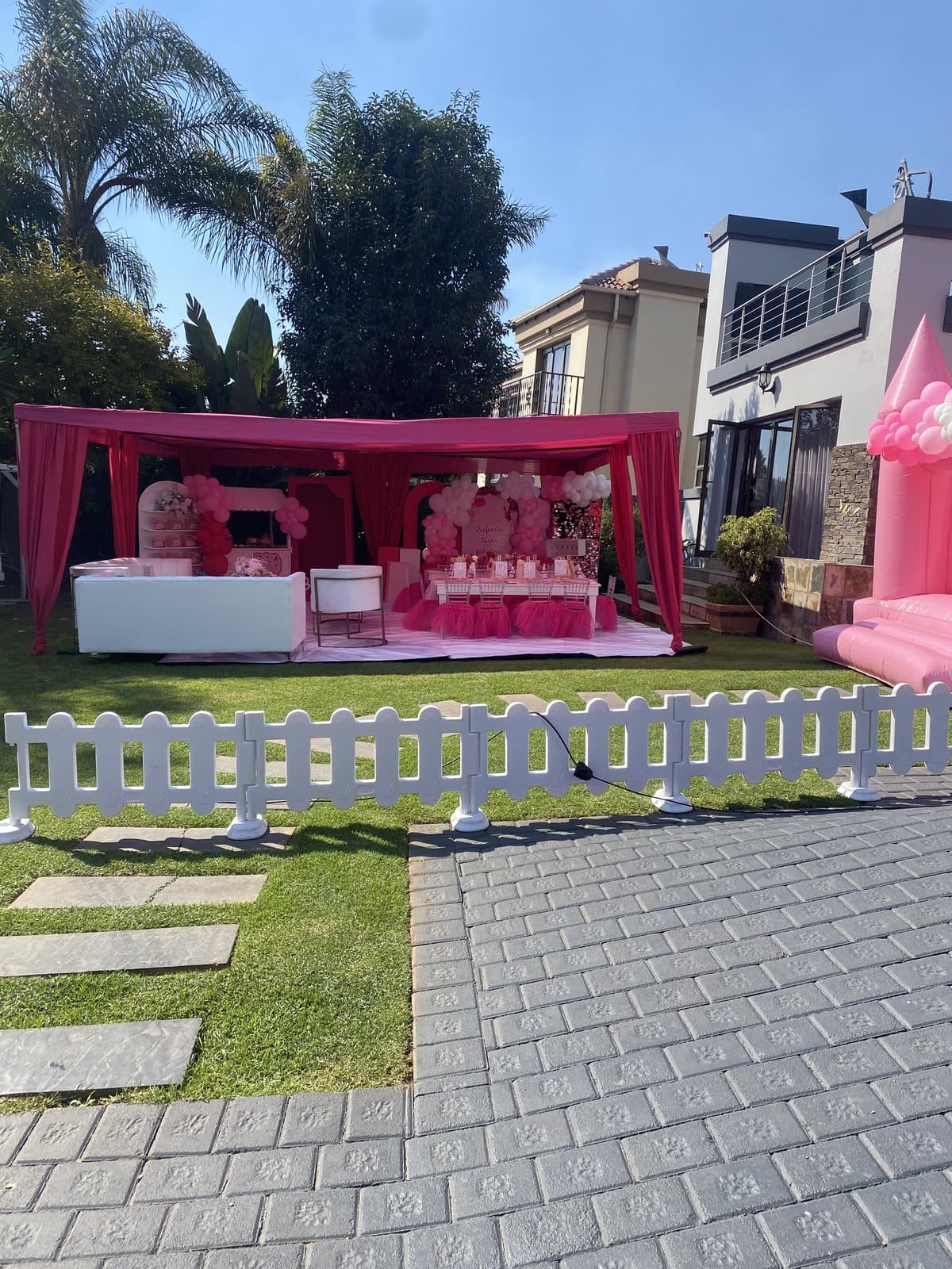 Hot pink cabana lounge exterior set up for a Barbie themed party